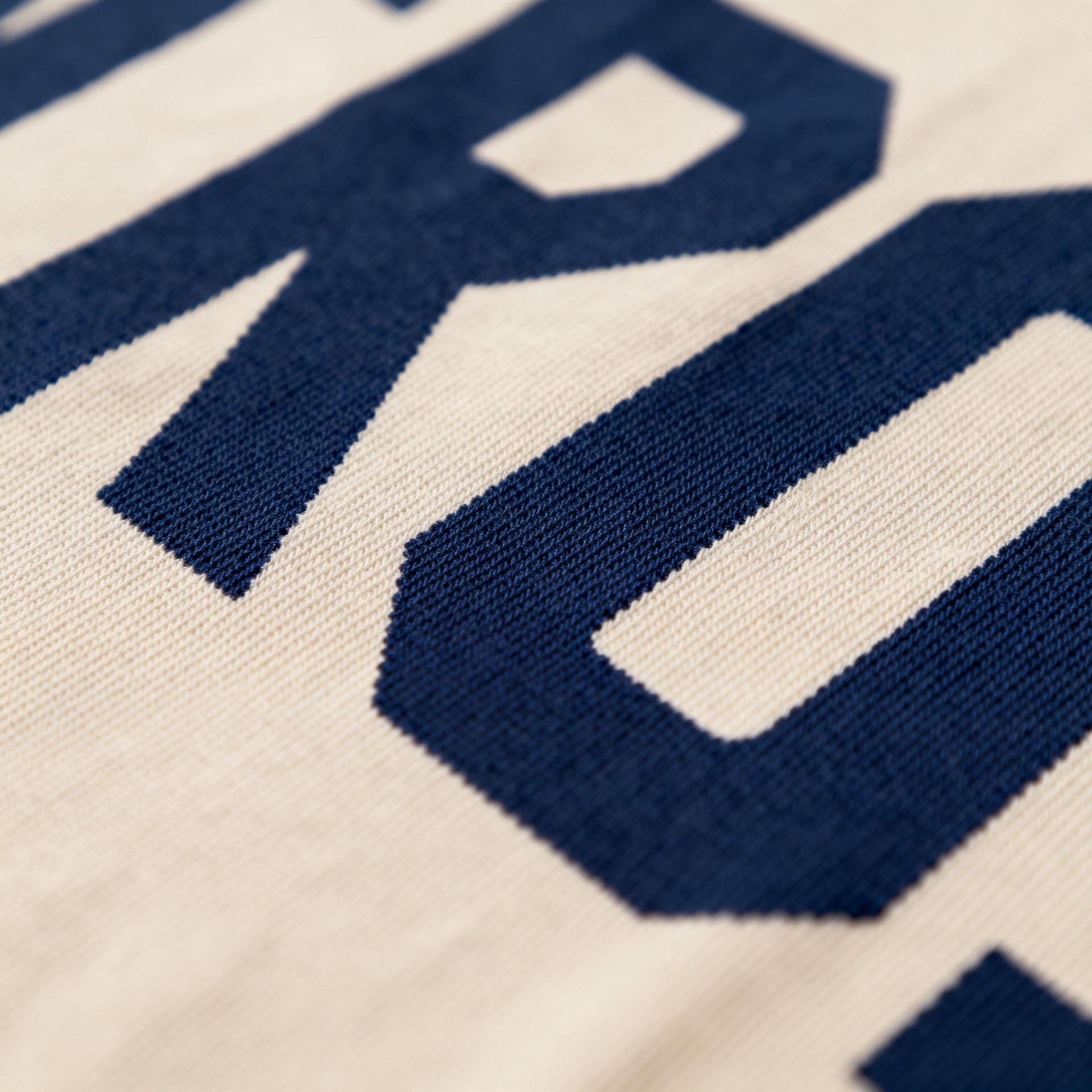 Ultra-macro of multi-color screen print registration showing precise layer alignment